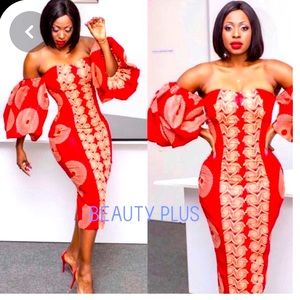 Beautiful African wedding Gown that includes matching face mask. size 16